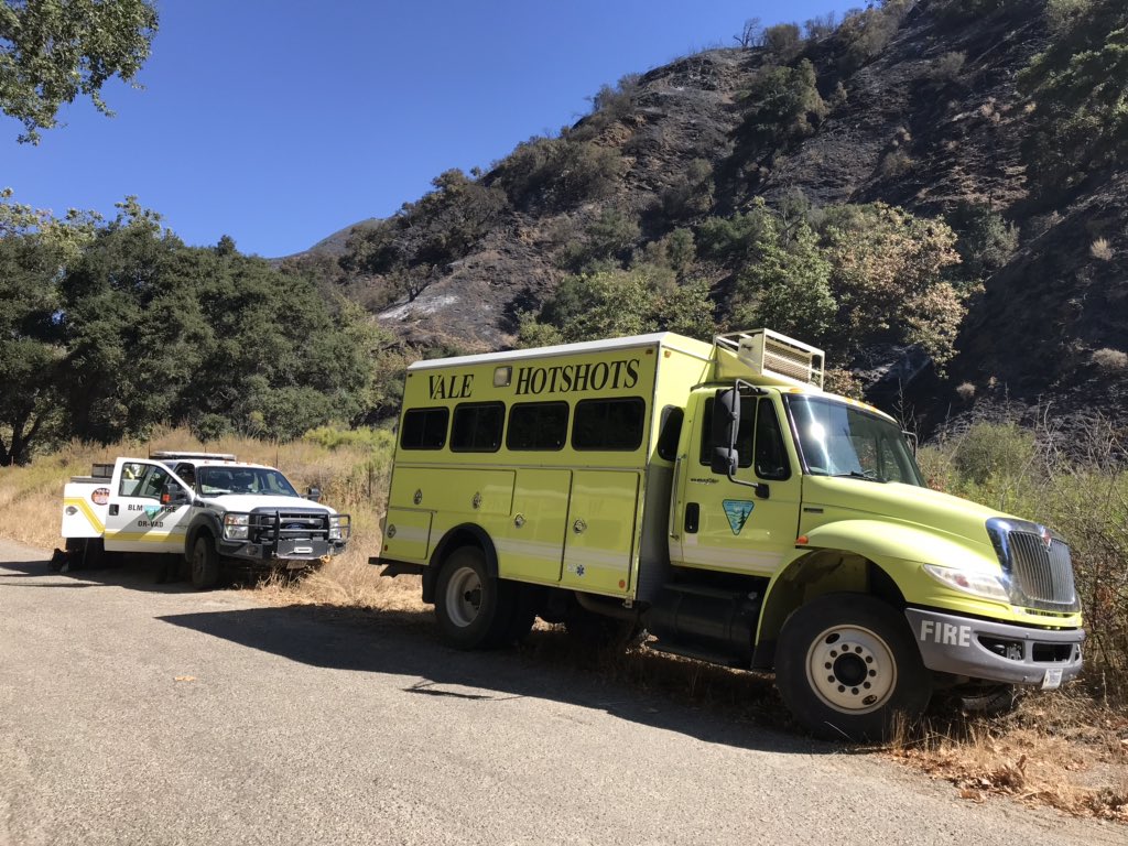 CALFIRE_SLO's tweet image. [IMAGES] #LopezFire #ValeHotShots from the #Oregon #Idaho boarder work on a steep rugged section of the fire at #LopezLake in #CountyofSlo.