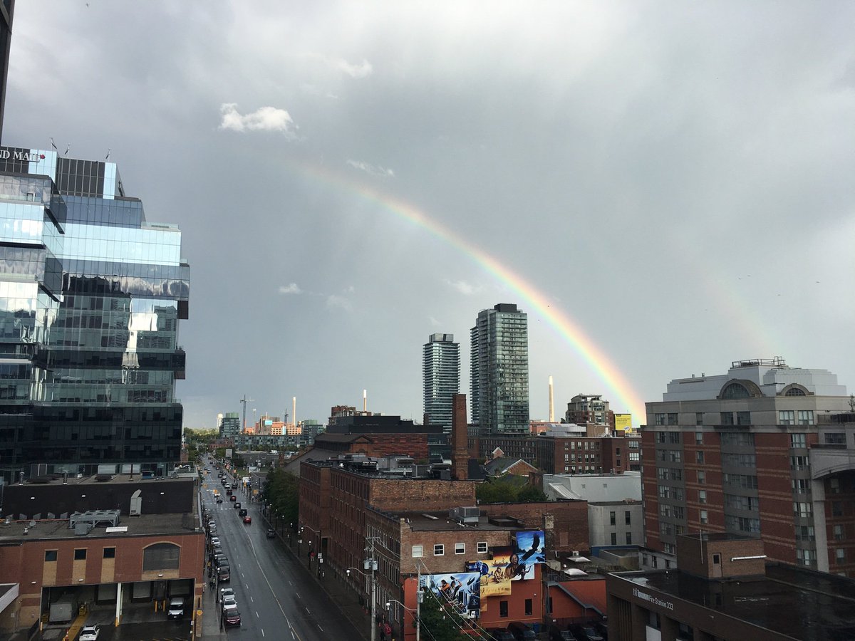 Sunshine and double rainbows after a splash of rain in downtown #Toronto 🌈🌈