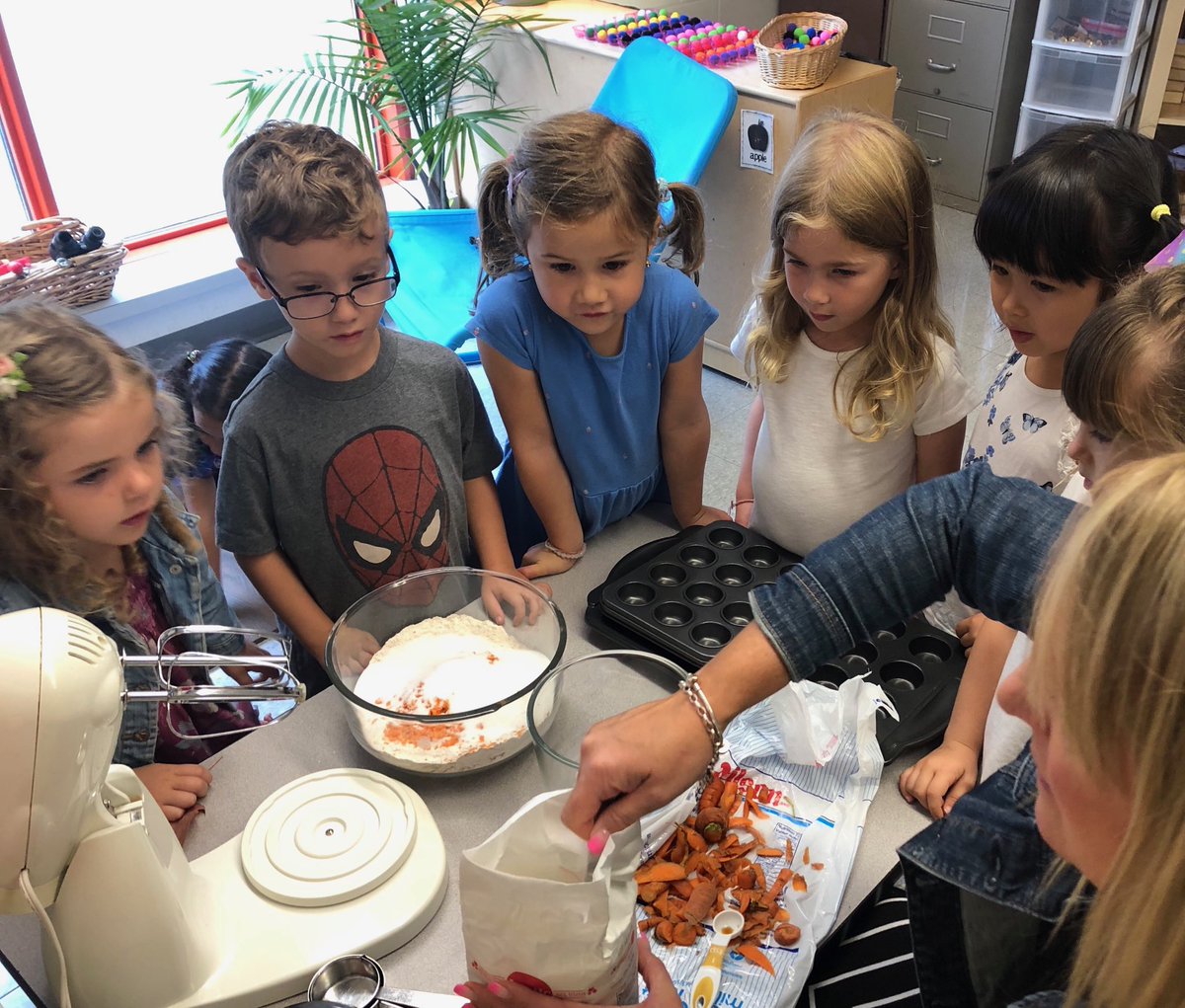 Carrot muffin Monday! Baking up a storm using the carrots from our garden. #mathisyummy #turntaking #healthysnack