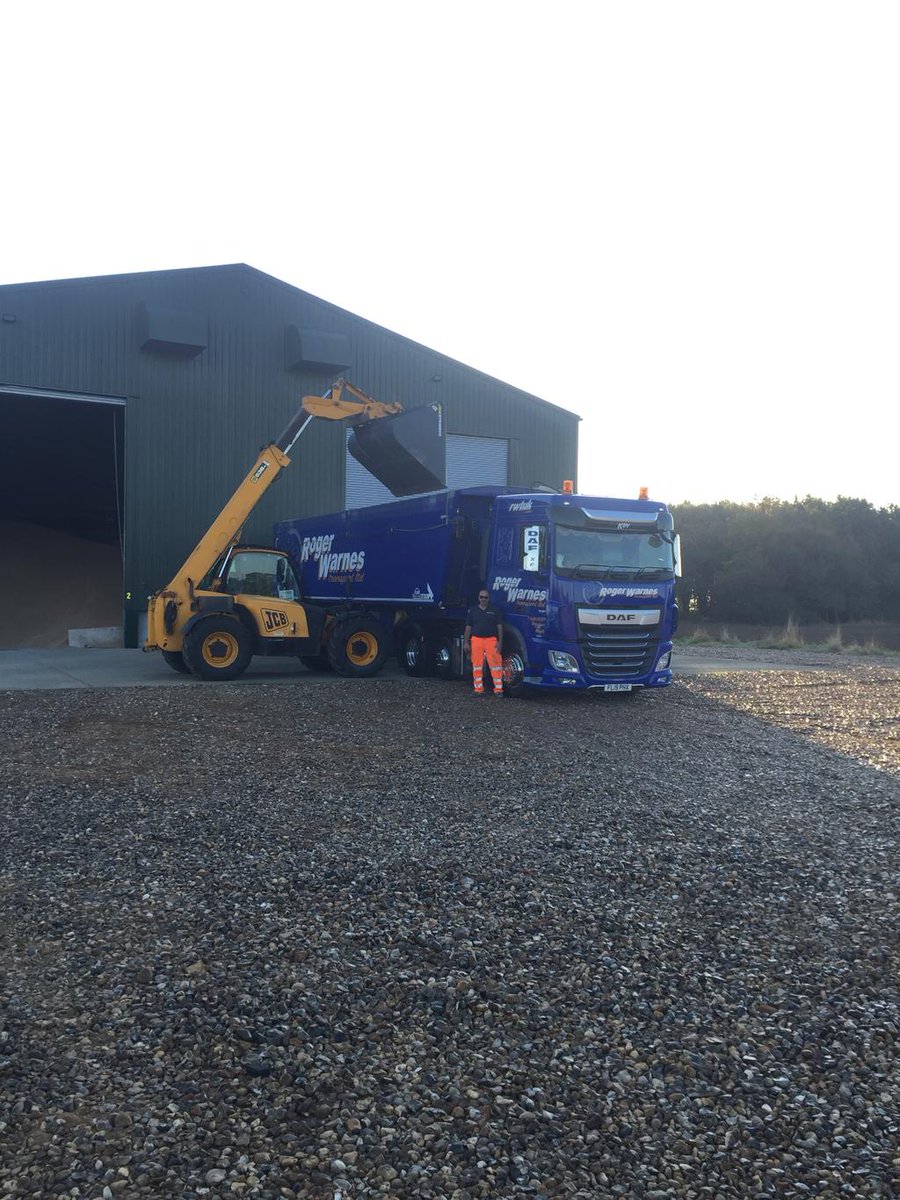 Kevin Eke collecting the first load of wheat out of T.H.Scott &amp; Son’s new Grain Store at Beeston.