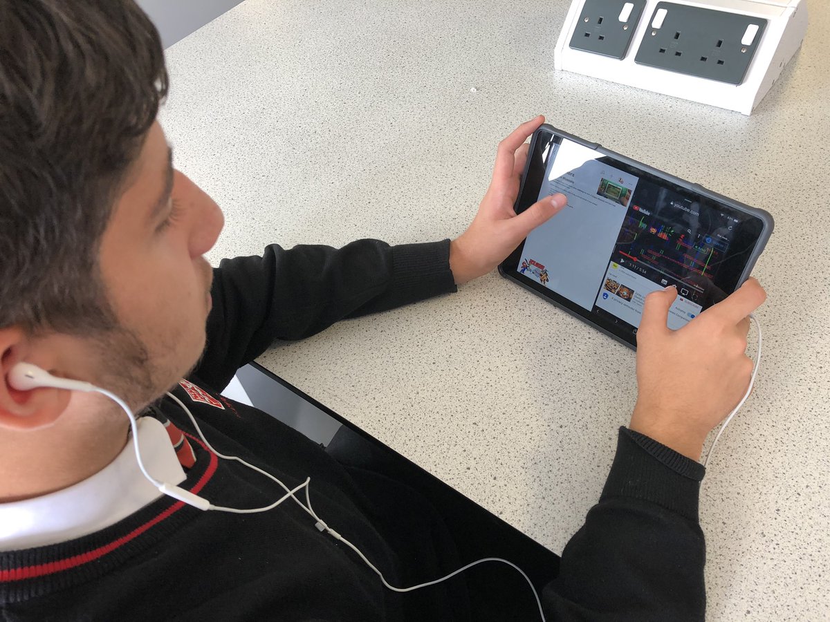 CyresDt's tweet photo. Great example of how split screen can help when researching in Engineering. Students using #Pages to write and @YouTube to watch a designers documentary on Shigeru Miyamoto. #AppleEduChat #Stcyreschat https://t.co/pCaC1Trc2j