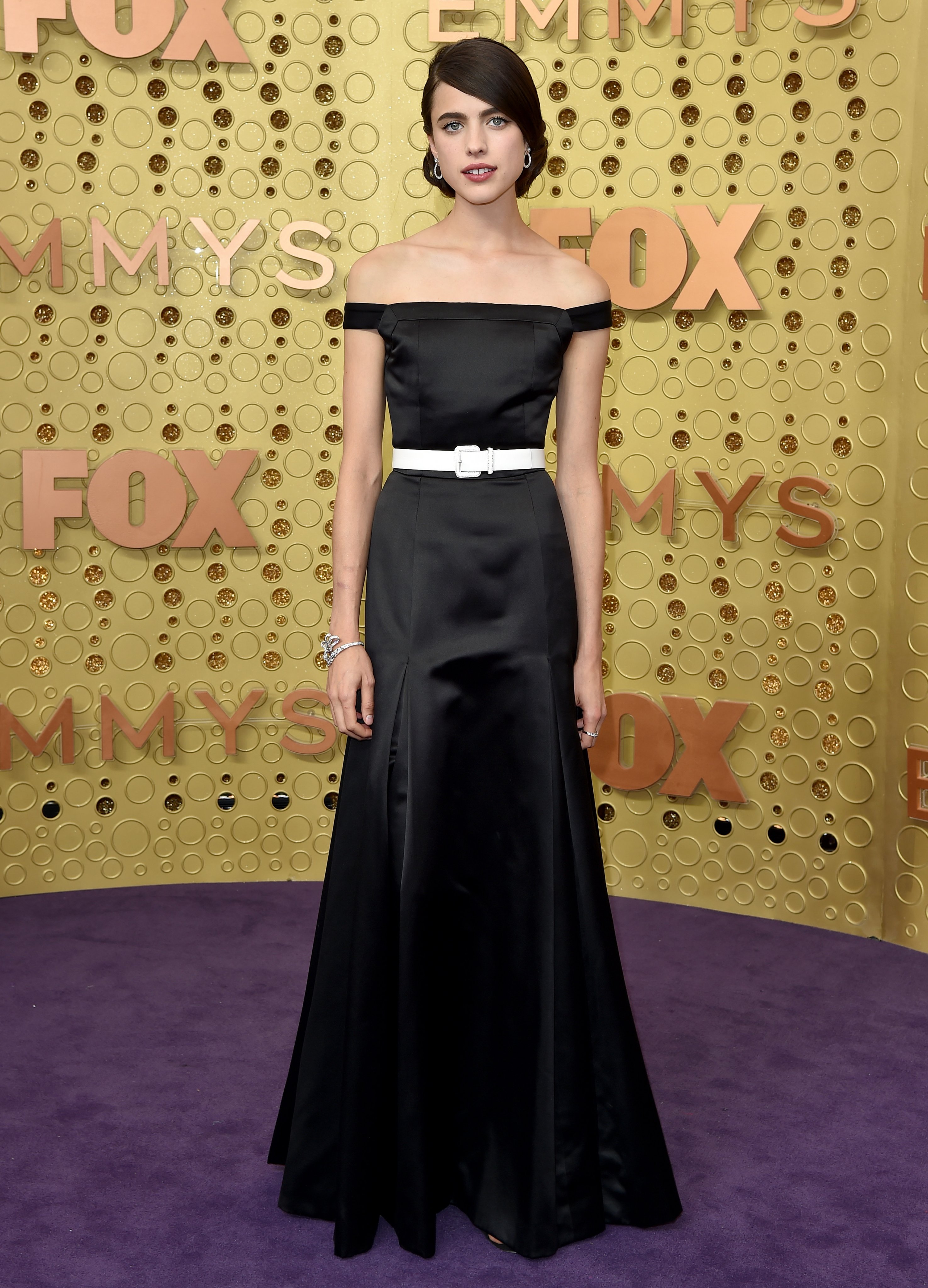 CHANEL - Actress Margaret Qualley wore a black muslin dress with a