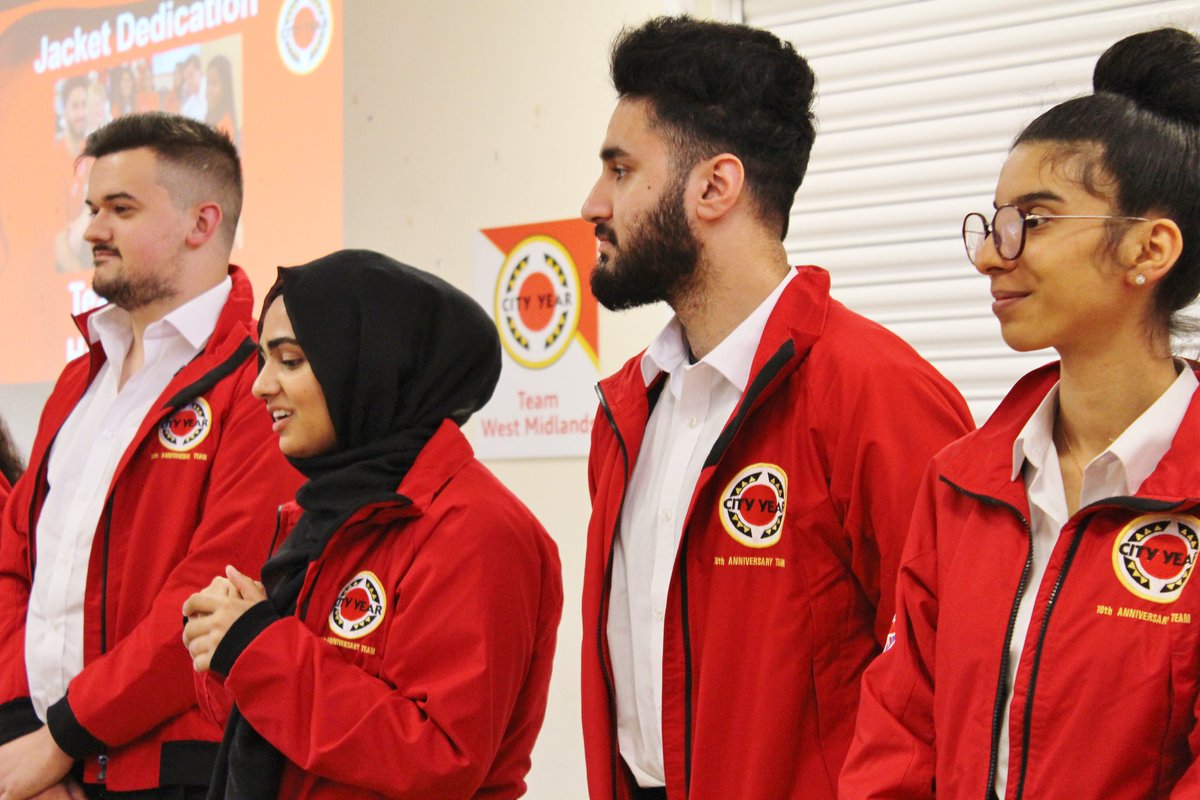 CityYearUK's tweet photo. Before starting their year combatting educational inequality full time in schools, our mentors receive their City Year Red Jackets and dedicate them to a person or cause that inspires them to #MakeBetterHappen #ReppingTheRed https://t.co/2w4EwqCQ2J