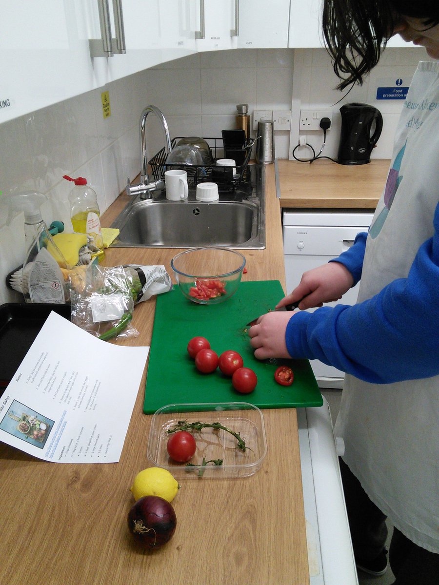 OT cafe @HolmewoodSchool is super busy today. What a splendid start with this young baking banana bread, cleaning up after independenly, and Myles cracking on with spicy salsa in his snack series #meaningful #occupations #lifeskills #independence #sensorymotorskills #motivation
