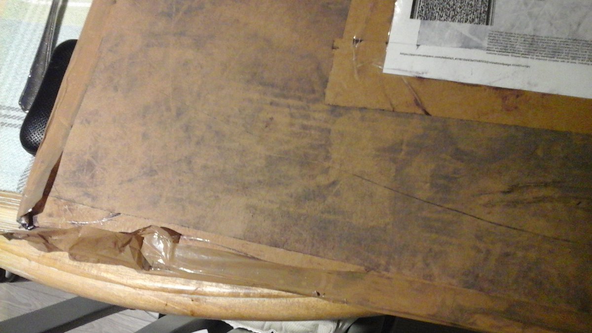 LazenbyVisuals's tweet photo. WOW, in over four years of mailing art around the world, I've never had anything damaged this badly. The compensation offered? A Β£15 credit note! It's been stood on and kicked around the floor! @ParcelCompare @UPS @VisitHelmsley #art #courierproblems #damaged https://t.co/0ltKzgbIhD
