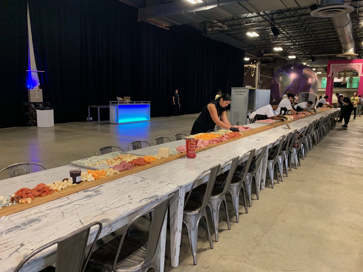 GWR's tweet photo. New record: @Datassential has just smashed the record for the largest charcuterie board with a spread that measured 150.5 ft (45.73m) long!
Smothered it with over 400 lb of meat, cheese, and other foods it looks nothing short of delicious😍🧀🍖🍇 https://t.co/bpHKVO4XFh