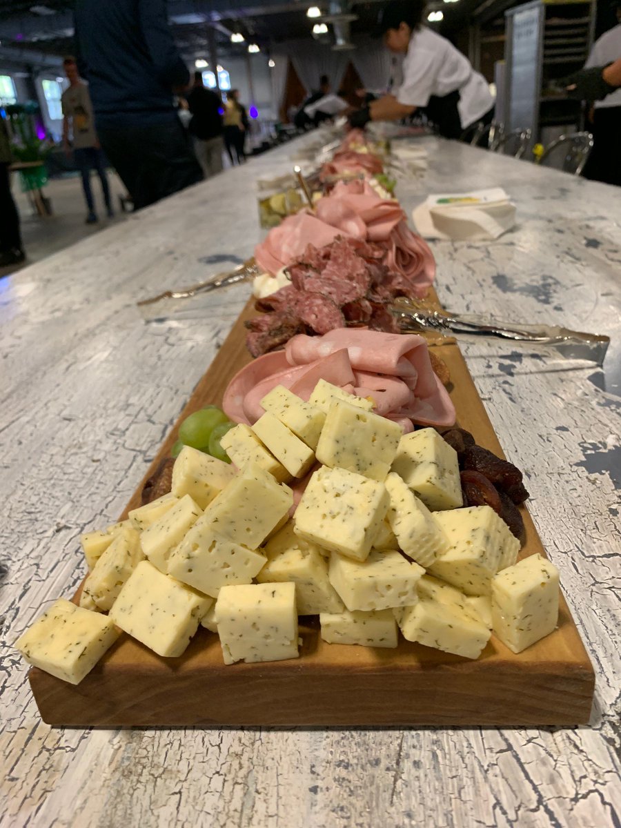 GWR's tweet photo. New record: @Datassential has just smashed the record for the largest charcuterie board with a spread that measured 150.5 ft (45.73m) long!
Smothered it with over 400 lb of meat, cheese, and other foods it looks nothing short of delicious😍🧀🍖🍇 https://t.co/bpHKVO4XFh