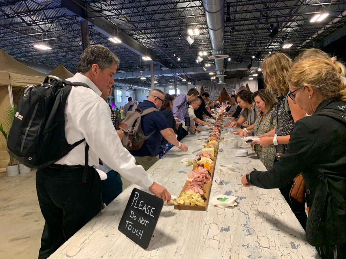 GWR's tweet photo. New record: @Datassential has just smashed the record for the largest charcuterie board with a spread that measured 150.5 ft (45.73m) long!
Smothered it with over 400 lb of meat, cheese, and other foods it looks nothing short of delicious😍🧀🍖🍇 https://t.co/bpHKVO4XFh
