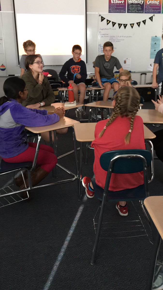 A fishbowl discussion turned debate on the ethics of The Giver society in 7th grade ALA. #southlearns