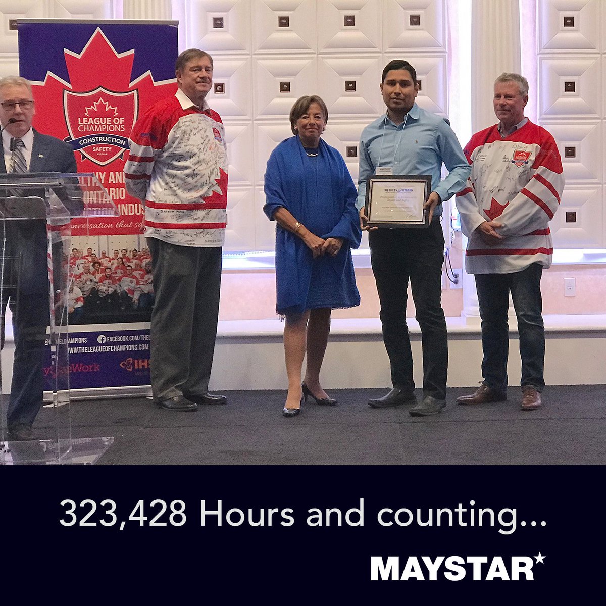 MaystarGen's tweet photo. H&amp;S Coordinator Gary Camacho accepts the OGCA Safety Achievement Award on behalf of Maystar for 88,541 hours worked with no lost time in 2018. 323,428 hours since 2015. Presenting the award were WSIB chair Elizabeth Witmer and Ontario’s Chief Prevention Officer Ron Kelusky https://t.co/DvaCfindRr