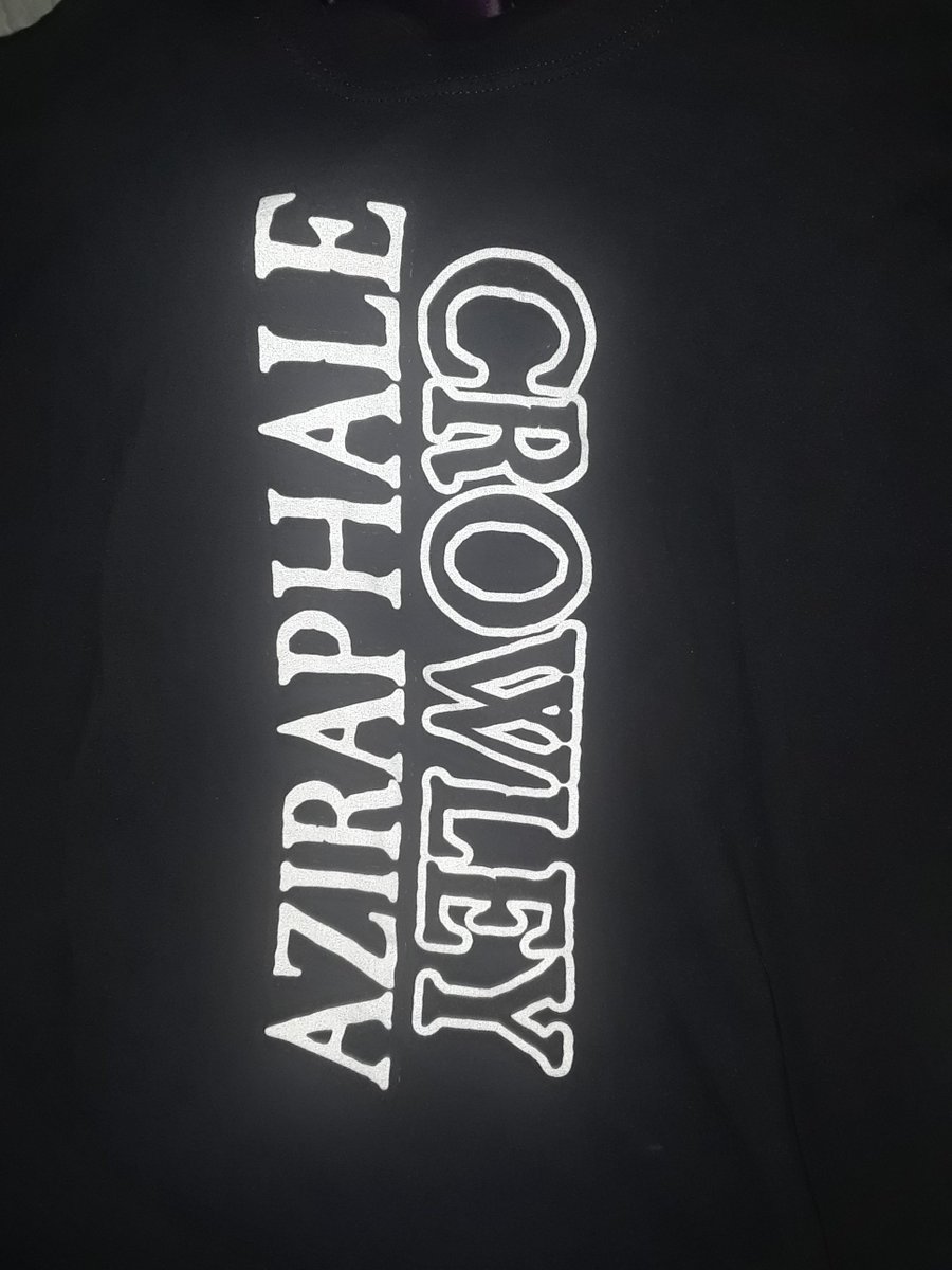 LoriDBrown's tweet photo. So, hows about another fandom shirt (brought to you by redbubble) for work tonight?! @michaelsheen @neilhimself  I have to show my support and my deep desire for another fan to walk in!! #GoodOmens #goodomensprime #Aziraphale #Crowley #DavidTennant https://t.co/kRpBzZxBdM
