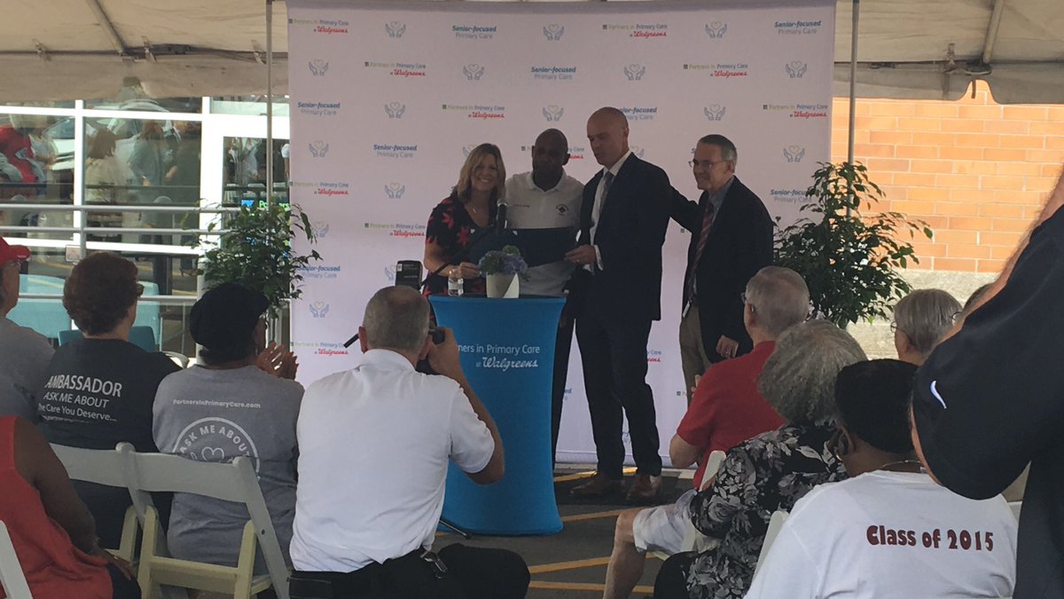 CityofGrandview's tweet photo. Mayor Leonard Jones delivers a proclamation to @Walgreens and #partnersinprimarycare celebrating their new partnership in #Grandview and dedication to serving our seniors. #BuildingTomorrowsCommunity https://t.co/wbxIMRqSi4