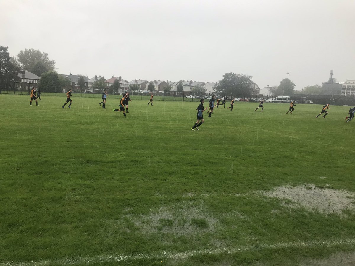 Year 11 in action this afternoon against @HarropFold! Great commitment shown by both schools in awful playing conditions!