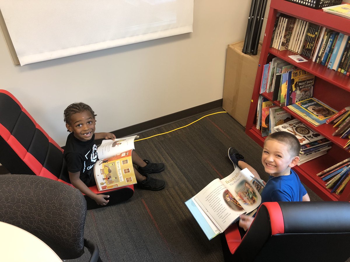 newsHgts's tweet photo. Jyare and Alexander picking out some books to read in the principals library. #choiceinreading https://t.co/O0FH38hfTO