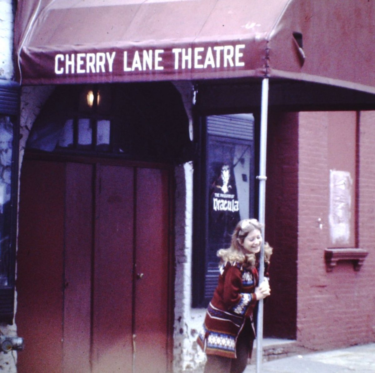 🍒 An autumn day in 1977 #NYC! A #CherryLanetheatre intern working on the production, #PassionofDracula poses for the camera. 42 years later - our interns still like to hang out under that canopy! ☺️ We would love to hear your stories of Cherry Lane in the #1970s!🕺🏻 📸nyartsprog