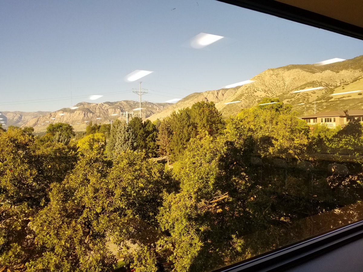 JHuntinghouse's tweet photo. When you are heading towards the staircase to leave work and you just want to take a photo of the beauty around you. @tabbank #ogden #BeaUTAHful #tabbank https://t.co/B6MzzxRSPC