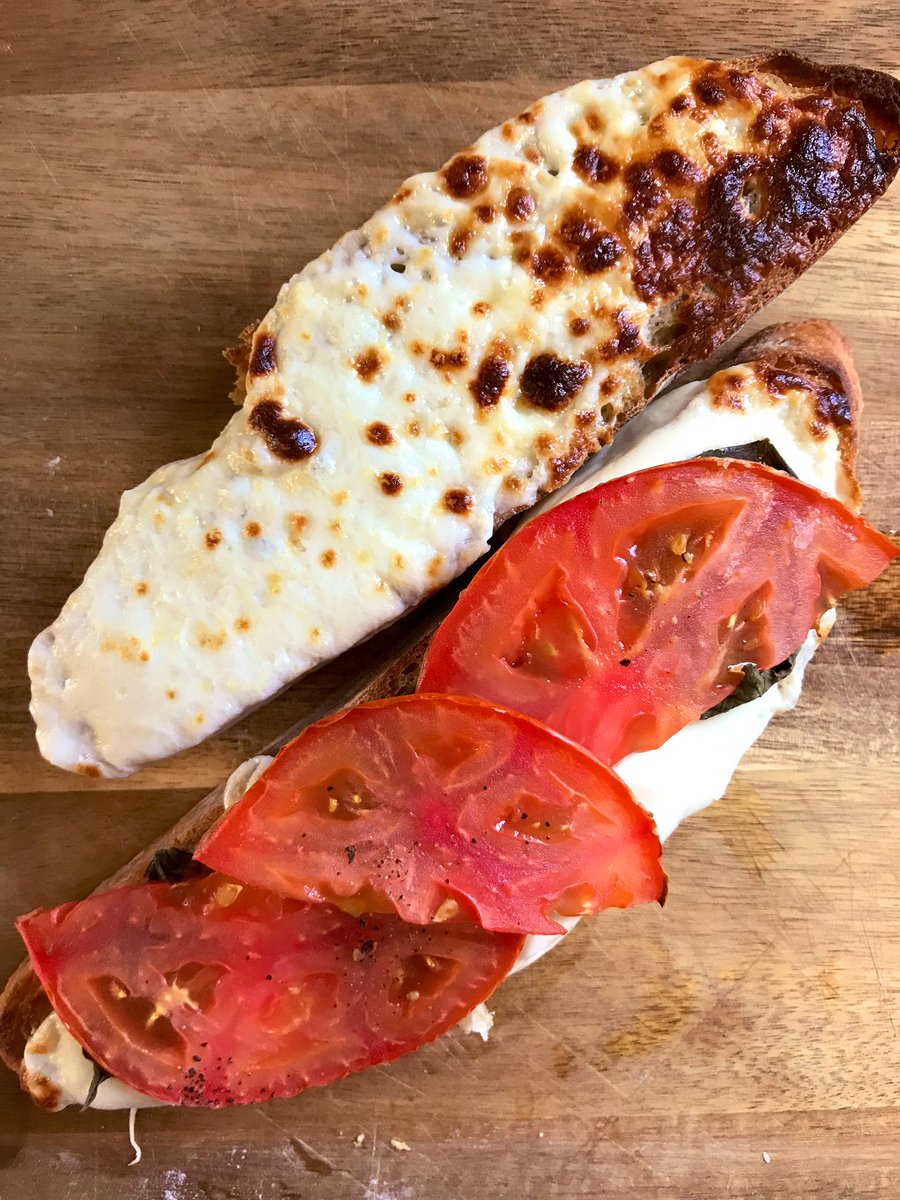 girleatstexas's tweet photo. Putting that rosemary garlic bread to work tonight with this mozzarella, basil and tomato grilled cheese ๐คค๐คค๐คค๐คค #openfaced #sandwich https://t.co/0UYhjjc1aM