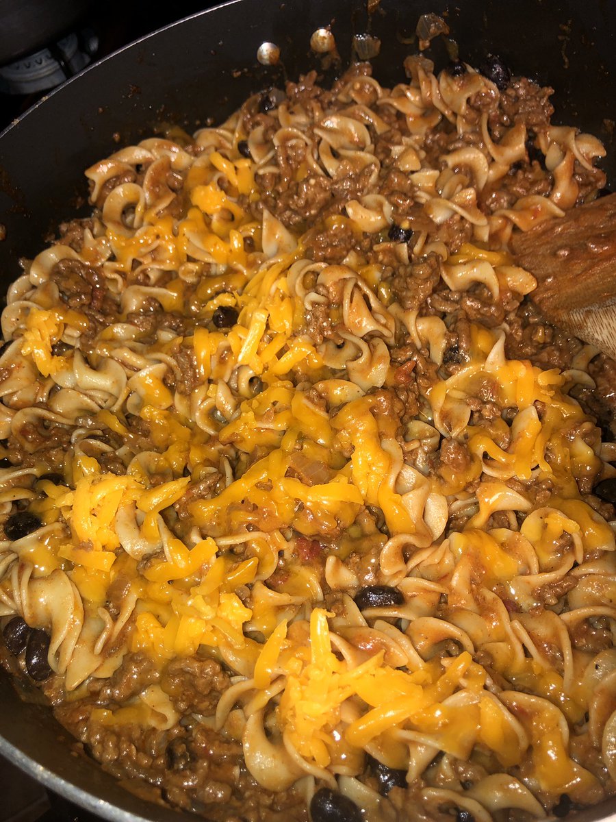 Quick & easy- use what we have in the pantry- type of dinner tonight ground beef, onion, garlic, tomato sauce, salsa, black beans & cheddar cheese for this mexican style stroganoff 