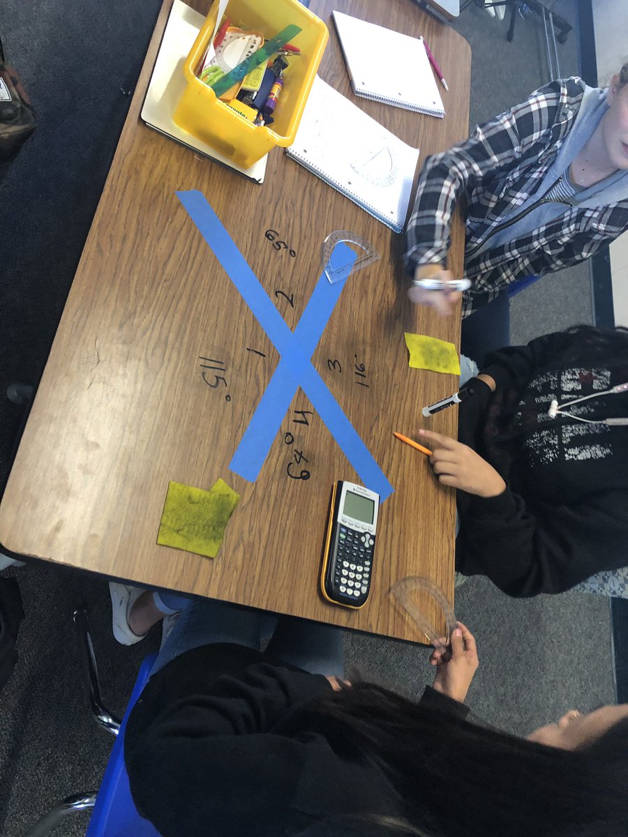 JHalstead604's tweet photo. Discovery activity for vertical angles today in geometry. Practiced using tools of geo, math talks, and collaborating. Kids loved getting to write on the tables! #iteachmath #handsonlearning #MTBoS #husdpremier #hamiltonbobcats https://t.co/NBsvwEPp3N