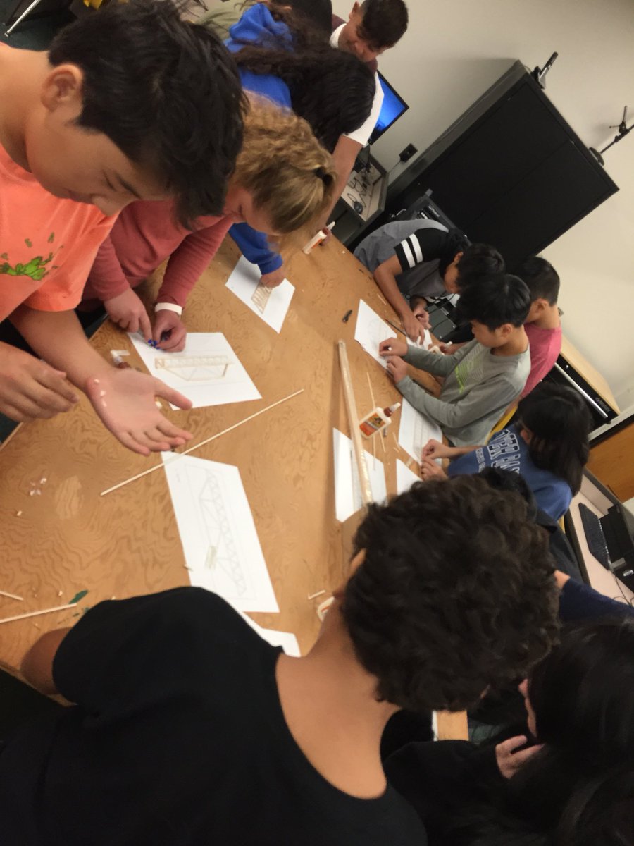 Students designed bridge structures in software and then drew models in CAD. Assembly time!