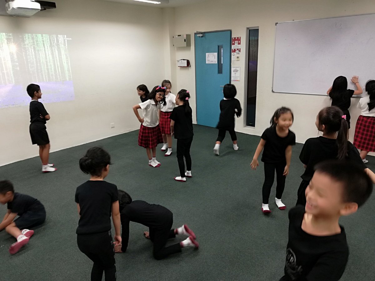 Primary drama- The Year 3 students explored mirroring where two students face one another. One pretends to be a person looking into a mirror while the other pretends to be reflection of that person, exactly duplicating the person's movements. #his_learning