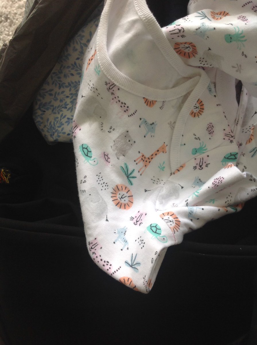 Tesco Amersham - donating clothes to Iain rennie charity shop today