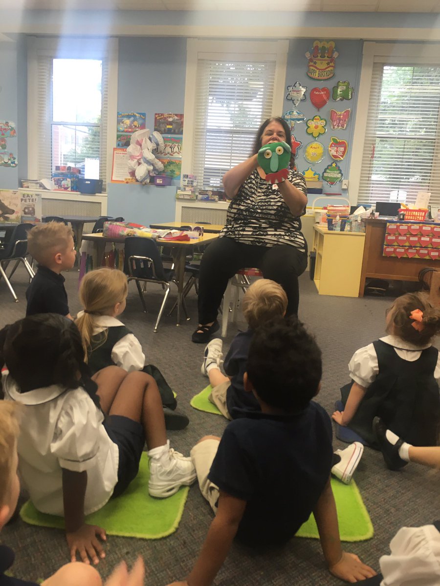AcademyPreK's tweet photo. Today we had a visit from Ms. Alice, a librarian from Kathryn Linnenman library. We listened to five different stories and voted for our favorite story at the end. Cookiesaurus Rex was the winner! Thank you @YourAnswerPlace for this fun opportunity! 📚 @ash1818 https://t.co/DKoJ5e70sM