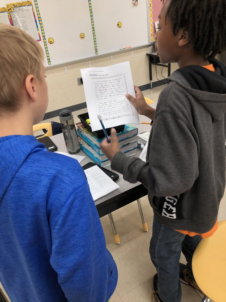 cassobishop's tweet photo. Getting familiar with our Informational Writing Rubric by scooting around the room and grading exemplar essays. #readitspeakitwriteit @ParkView_Knight @BradleySchools https://t.co/o6FAQEpyyC