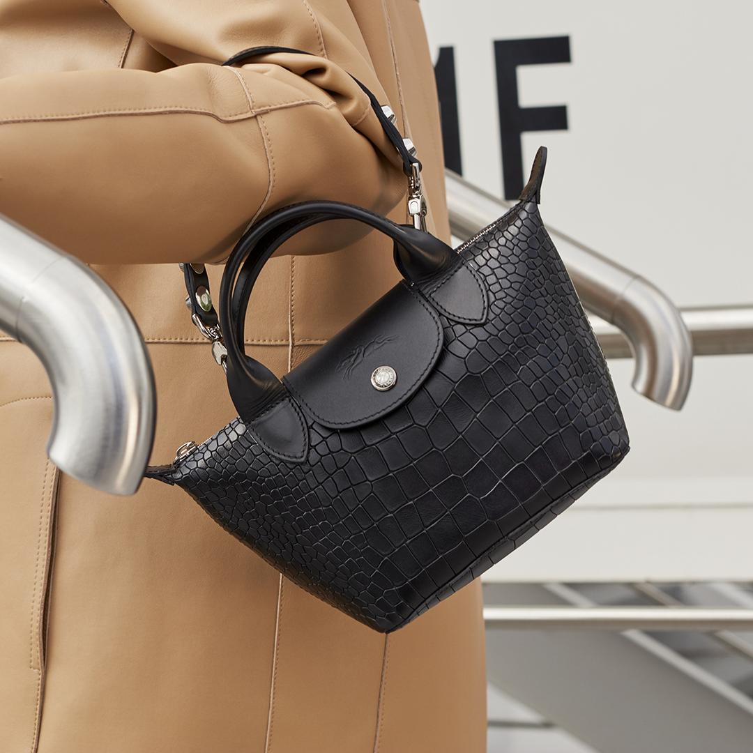 Longchamp on X: Swap your tote bag for a mini Le Pliage and jump