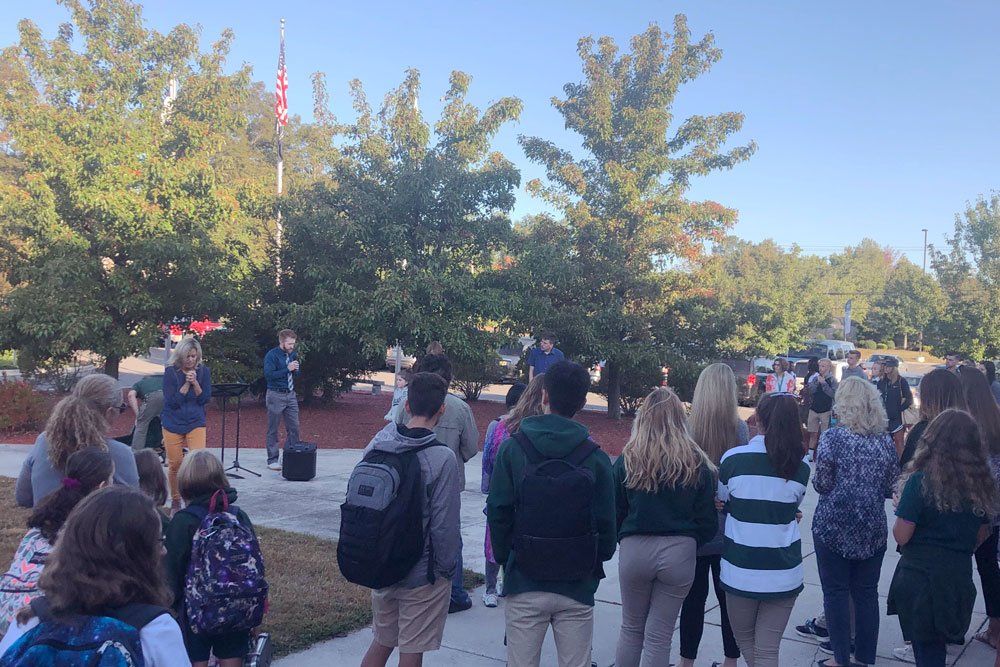 acseht's tweet photo. Students, teachers, administrators, and parents gathered today to pray and sing worship songs before the start of school -- joining thousands of others across the country for the national #SeeYouAtThePole event. https://t.co/J37VPKLBIH