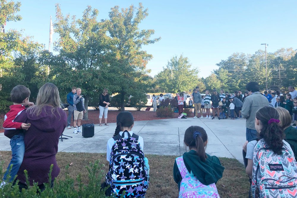 acseht's tweet photo. Students, teachers, administrators, and parents gathered today to pray and sing worship songs before the start of school -- joining thousands of others across the country for the national #SeeYouAtThePole event. https://t.co/J37VPKLBIH