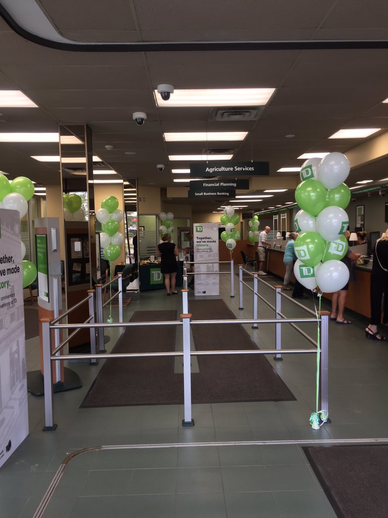timedgarTD's tweet photo. We are celebrating TD in Sarnia 50 years to at the London Rd Branch! A great day had by all past and present! A re-creation of a picture from 1989 of the mayor then and now in the branch. @MaulikBhatt_ @ShaneKennedy_TD @Sarnia_Ontario https://t.co/qRp4M8uIZI