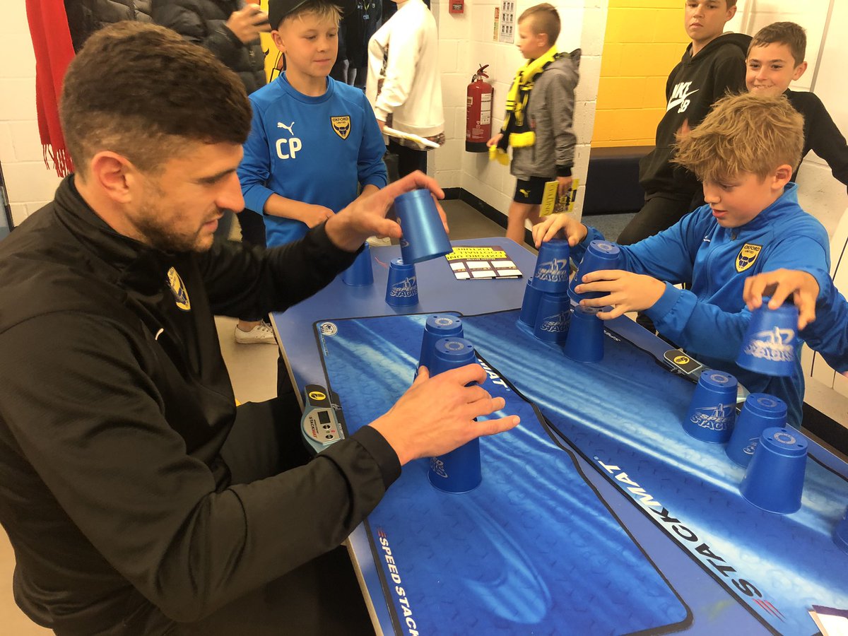 OUFCOfficial's tweet photo. Club Captain John Mousinho has taken over the family room! #OUFC https://t.co/eQh16w7pst