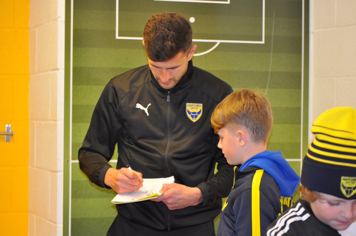 OUFCOfficial's tweet photo. Club Captain John Mousinho has taken over the family room! #OUFC https://t.co/eQh16w7pst