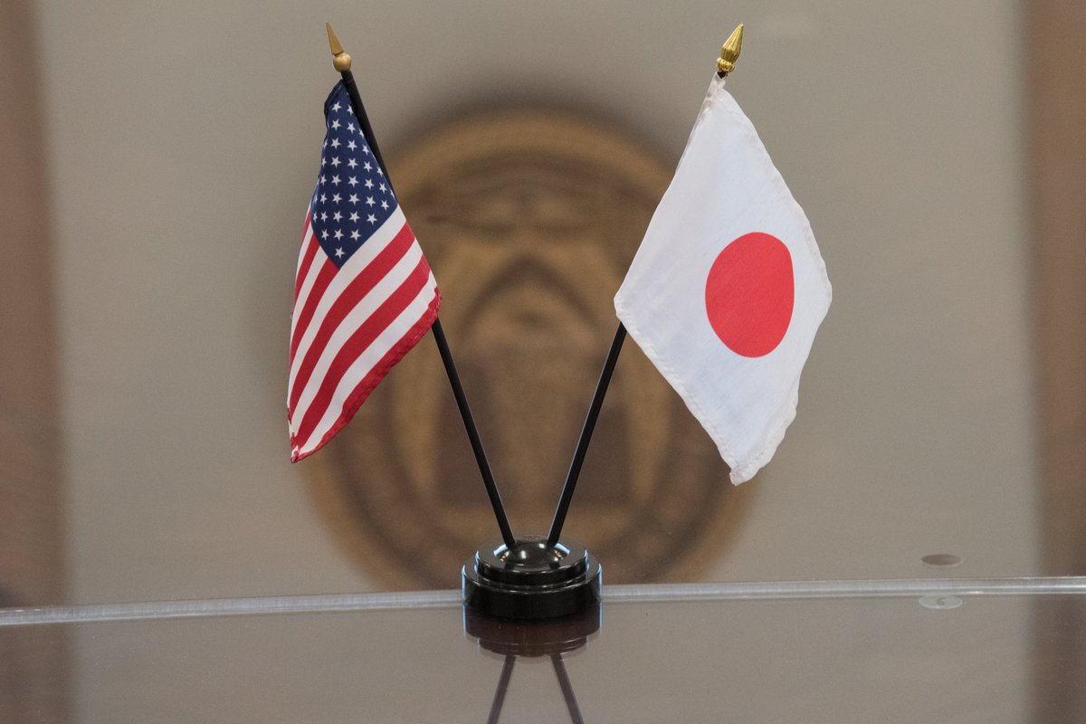 Photo of U.S. and Japan flags.