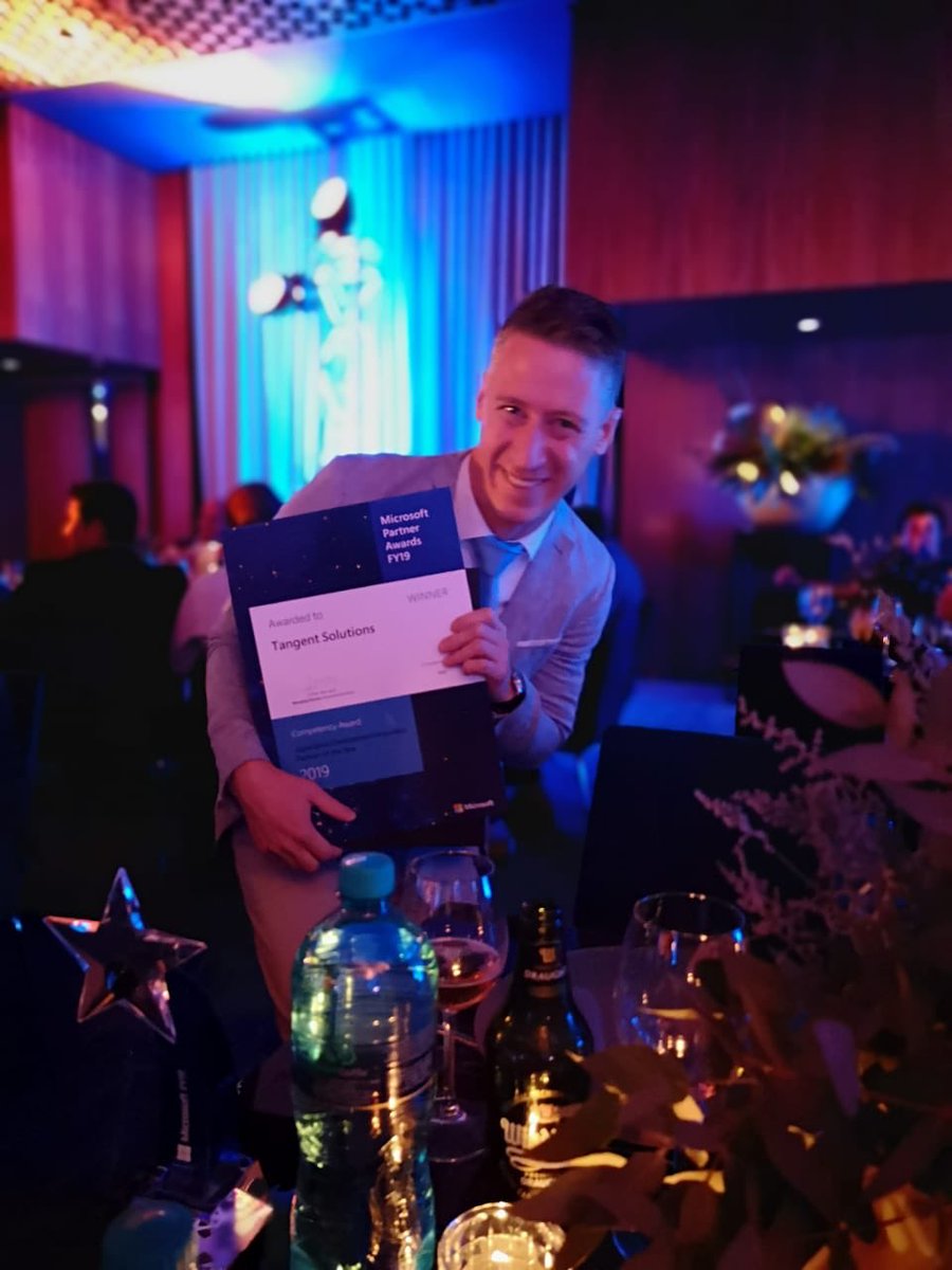 Bossman <a href="/TangentDave/">TangentDave</a> holding one of two awards <a href="/TangentZA/">Tangent Solutions</a> won at this years <a href="/MicrosoftSA/">Microsoft SA</a> partner awards. Congrats to everyone at Tangent Solutions. Couldn’t be prouder to work at Tangent.