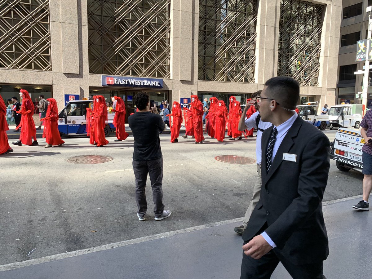 anirvan's tweet photo. There's something deeply off, and it's hard to pinpoint why. Passers by keep whispering, pulling out their phones, seeing @ExtinctionR @xrsfbay's Red Rebel Brigade
#ClimateStrike #climatejusticeSF #ClimateActionNow #ClimateStrikeSF https://t.co/NFbSG3hqTj