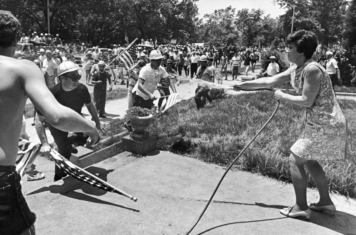 mohistorymuseum's tweet photo. The #VietnamWar was a time when photojournalists put themselves in danger trying to accurately depict both the war overseas and tensions at home. Here, @stltoday photographer Lynn Spence captured a confrontation on Lindell Blvd in 1970. Learn more in our #InFocusSTL exhibit. https://t.co/zAVlMCRZCw