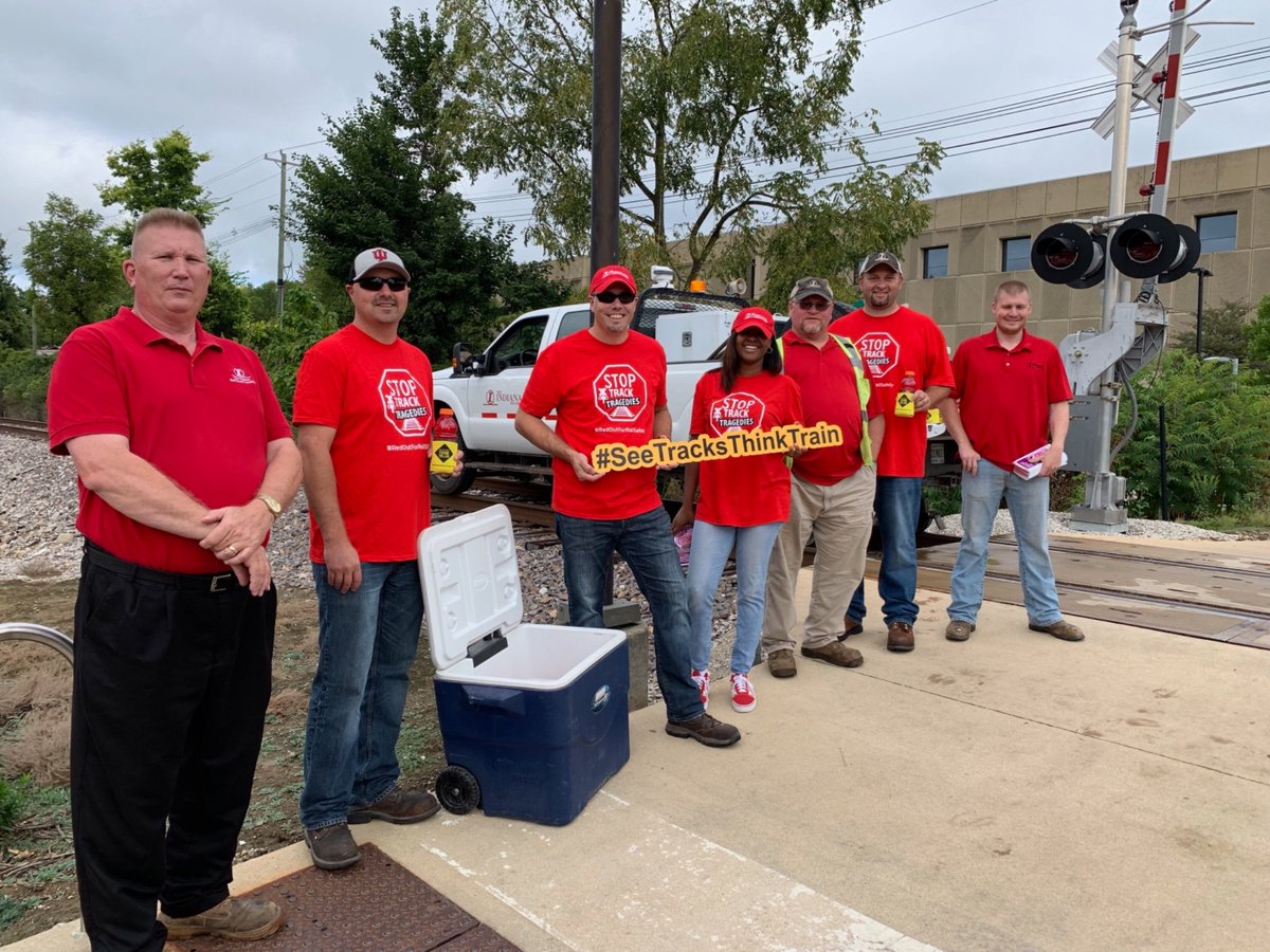 IndianaRailRoad's tweet photo. INRD employees conducted a “Rail Safety Blitz” on Indiana University-Bloomington Campus. The team provided students with giveaways and urged them to keep safe near highway-rail grade crossings and railroad rights-of-way. #USRailSafetyWeek🚂 #SeeTracksThinkTrain https://t.co/OL6Ml8vcv7