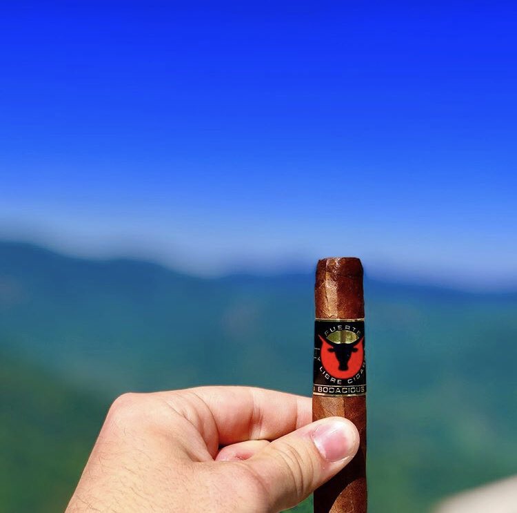 FyLCigars's tweet photo. Like father like son . . . My son Joey climbed Old Rag yesterday and then celebrated at the top with a Bodacious Maduro.

If you haven’t tried Bodacious maybe it’s time to reach for new heights.

Smoke Strong, Live Free 
#FuerteyLibre #FYLCigars #FirstFuerte https://t.co/lLGUbMBm8B
