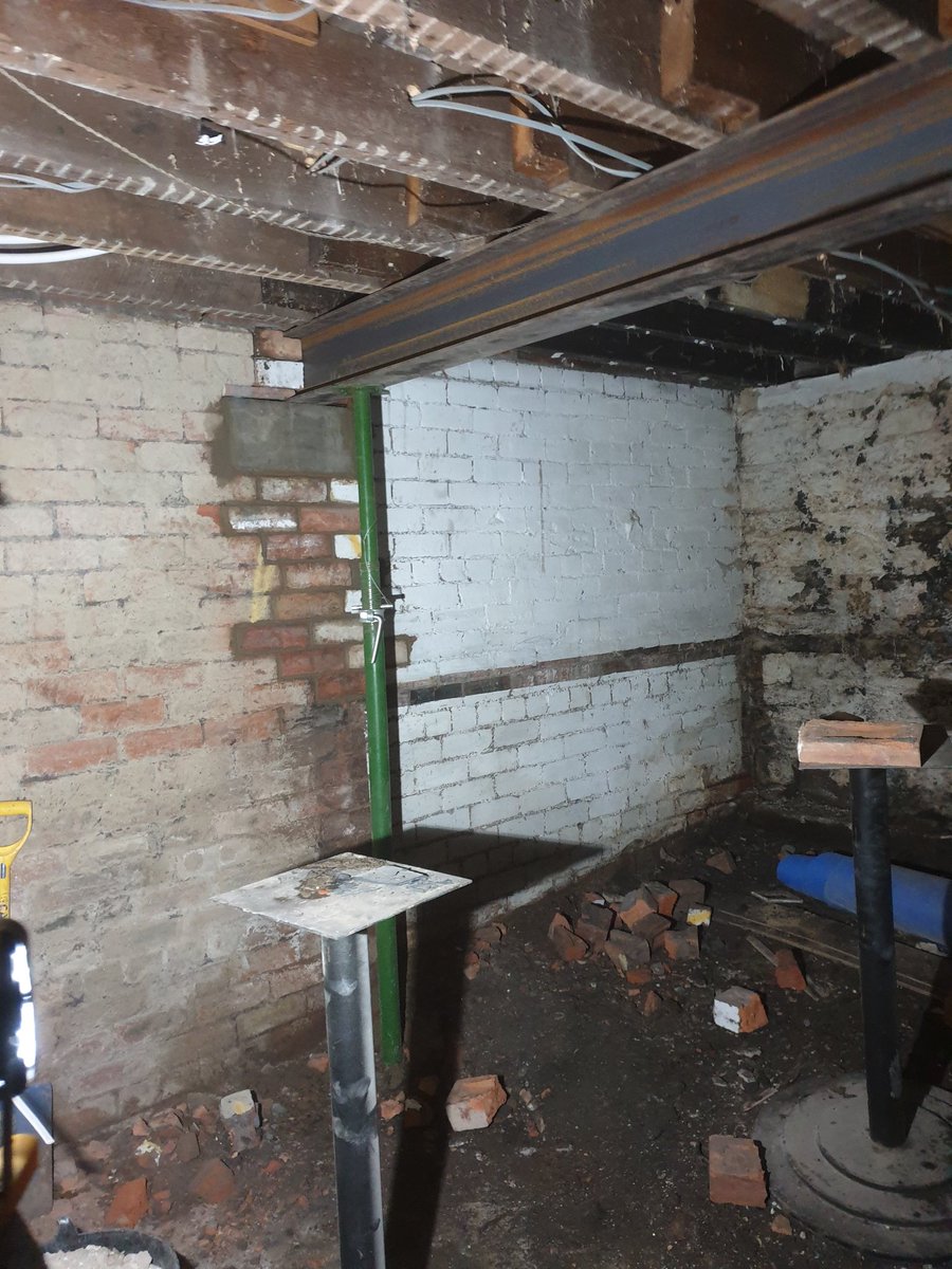 GSJoineryYorks1's tweet photo. Installing this 5 metre structural steel in this cellar where supporting wall has been removed. Steel pocketed through existing chimney breast and into external wall sat on padstone either side. #builders #cellarconversion #homeimprovement see https://t.co/WPOCQ8ADsk for more https://t.co/A49OP56T8G
