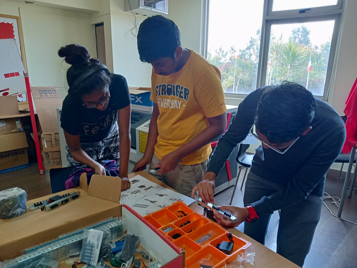 MohammedSIS's tweet photo. Robotics club students assembling their robots. Students are excited to make robots with vex robotics.@JoeALumsden @SIS_secondary @Stonehill_SIS https://t.co/vcvkKrMXt1