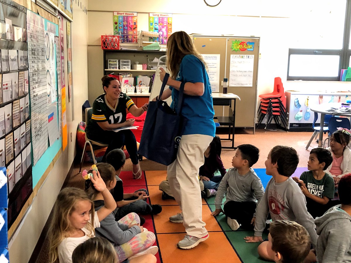 OSMSGB's tweet photo. Two of our team members visited local schools this morning to encourage kids to nominate their teachers for the #GoldenAppleAwards this year. Teachers also received a sweet treat for all their hard work. #LifeAtOSMS https://t.co/pAf4JrJEbX
