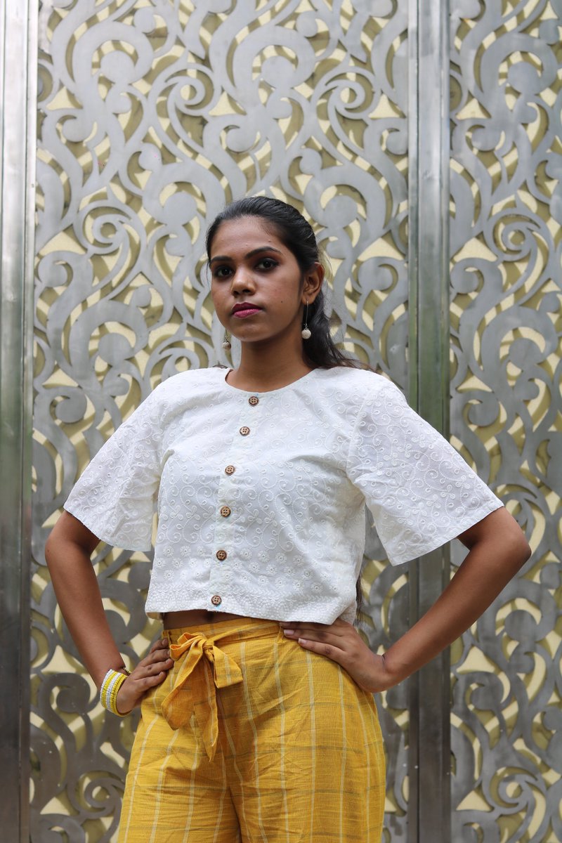 essenceandethos's tweet photo. This white chikankari top comes with wooden buttons and is paired with yellow box style checkered pants which comes with an adjustable belt.                                                       Features:Cotton fabric, wooden buttons,checkered pattern, cotton lining,biodegradable https://t.co/vzhnfvjVQA