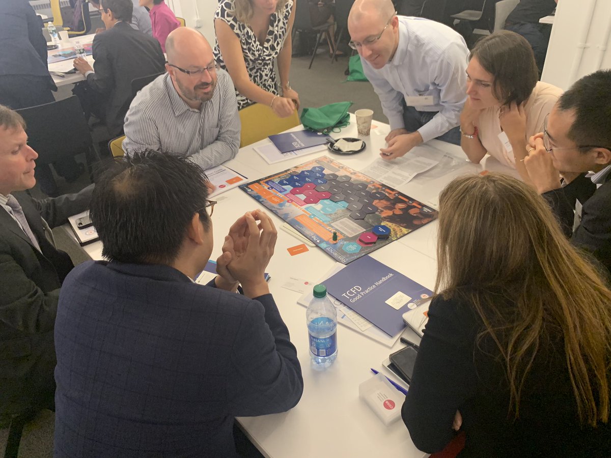 MardiMcB's tweet image. Participants in @EY_US @CDSBglobal annual #ClimateWeekNYC event playing the corporate survival game #resilience  #tcfdaction