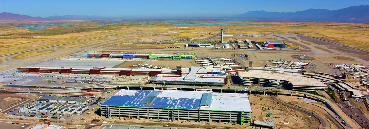 slcairport's tweet photo. Fall has arrived at the Salt Lake City International Airport. This aerial photo shows-off #TheNewSLC Airport construction project adjacent to the existing airport and runways, surrounded by golden hues. https://t.co/Y04obOLDP4