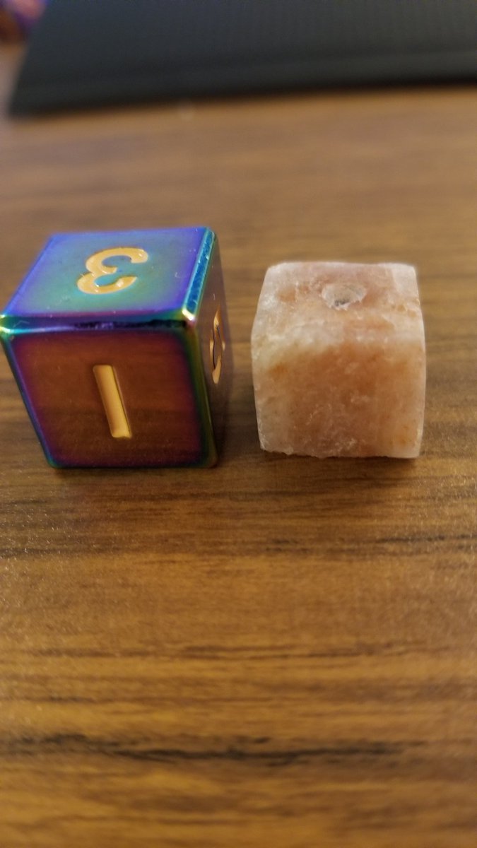 Made another die today. Used sunstone this time. Sizing is still off but I'm getting better. Decided to only cut one pip this time. No injuries this time around though which is great! #dice #lesspain