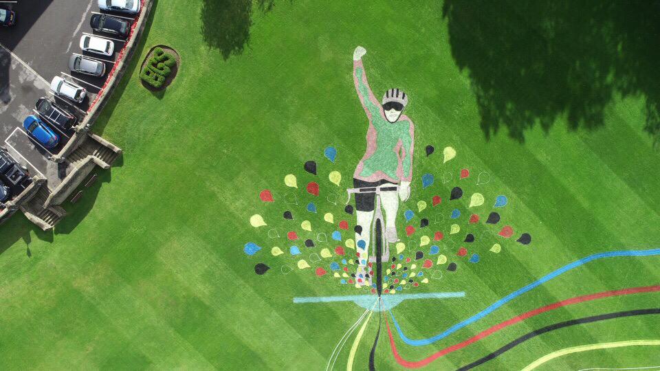 Commissioned by <a href="/bradfordmdc/">Bradford Council</a> this dual site artwork links Lister Park and @BradfordGrammar . A member of <a href="/queeniequeensCC/">QueensburyQueens</a> follows the <a href="/UCI_cycling/">UCI</a> World Championship ribbons through a broad ford (from which Bradford takes its name) and makes a splash to celebrate Bradford!