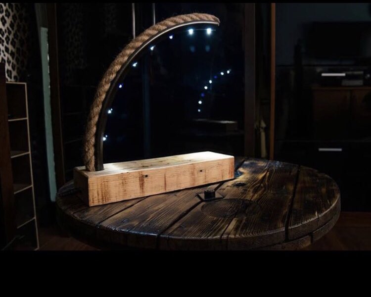 RustyDiamondSa's tweet photo. This beautiful #lamp is 100% #upcycled from #wood, #bicycle #rim, #rope & #unused electricals. It possesses 2 #UV #LED’s that reach with the I’ve powered #resin insinuated in the #wooden base, giving it a piece full #glow when the #light is switched off. #recycle #rustydiamond https://t.co/fteFjDFukz