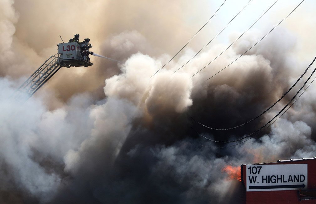 ACampbell_RMT's tweet photo. Rocky Mount Fire Department firefighters battle a blaze at That Place Inc., a solid wood furniture manufacturer, from atop Ladder 30 on Thursday at the business on Highland Avenue.  #firefighter #firefighting https://t.co/d2KSICuiIE
